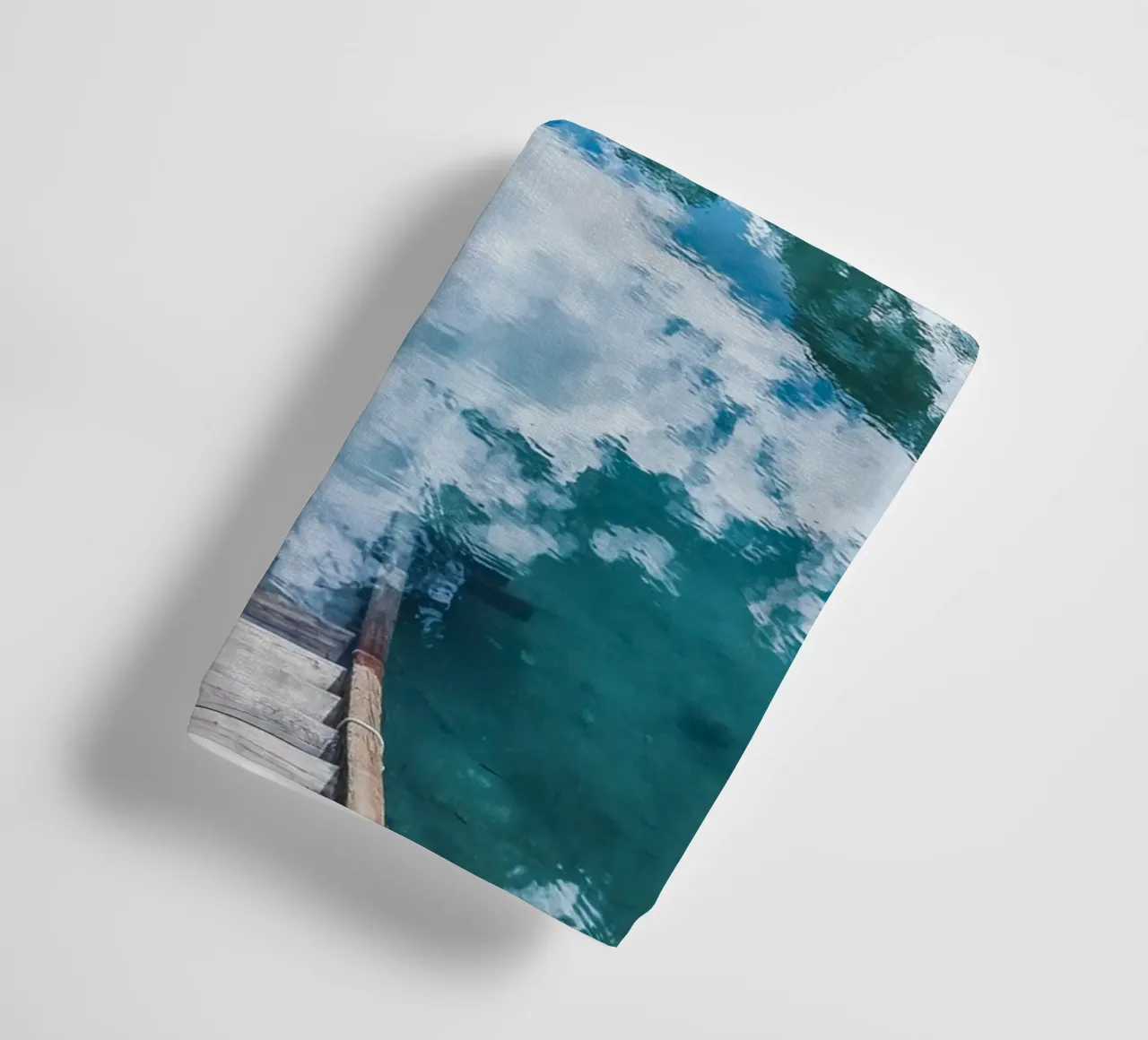 Reflecting mountain lake with jetty towel by Whole©