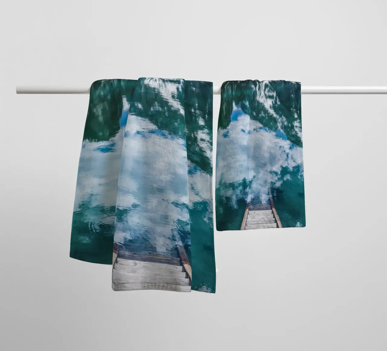 Reflecting mountain lake with jetty towel by Whole©