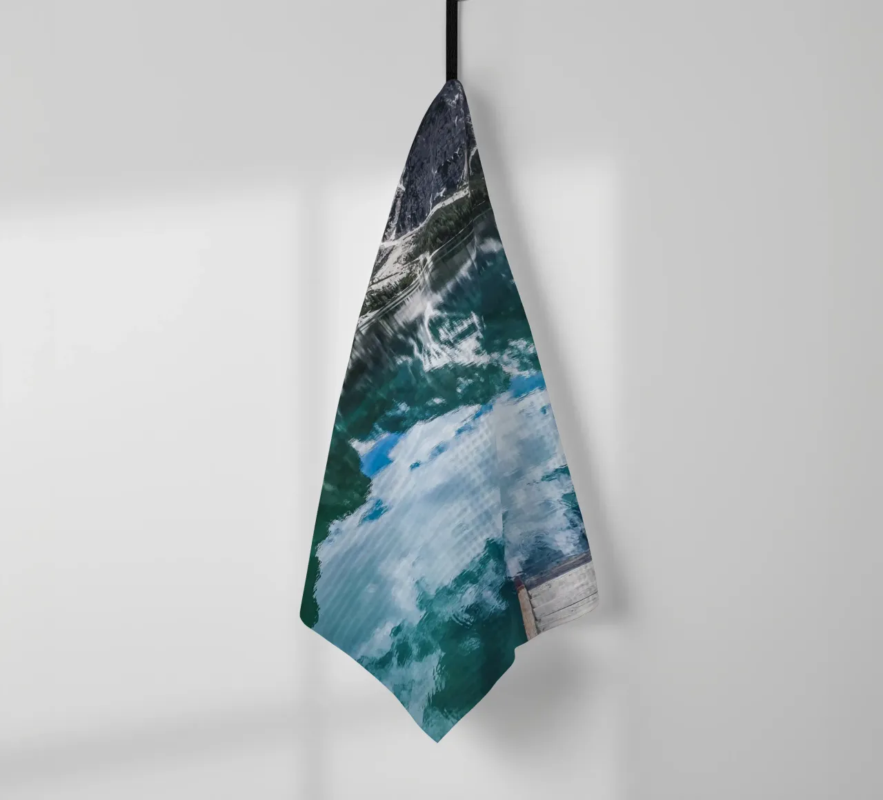Reflecting mountain lake with jetty tea towel by Whole©