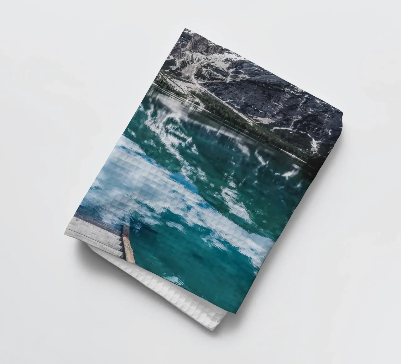Reflecting mountain lake with jetty tea towel by Whole©