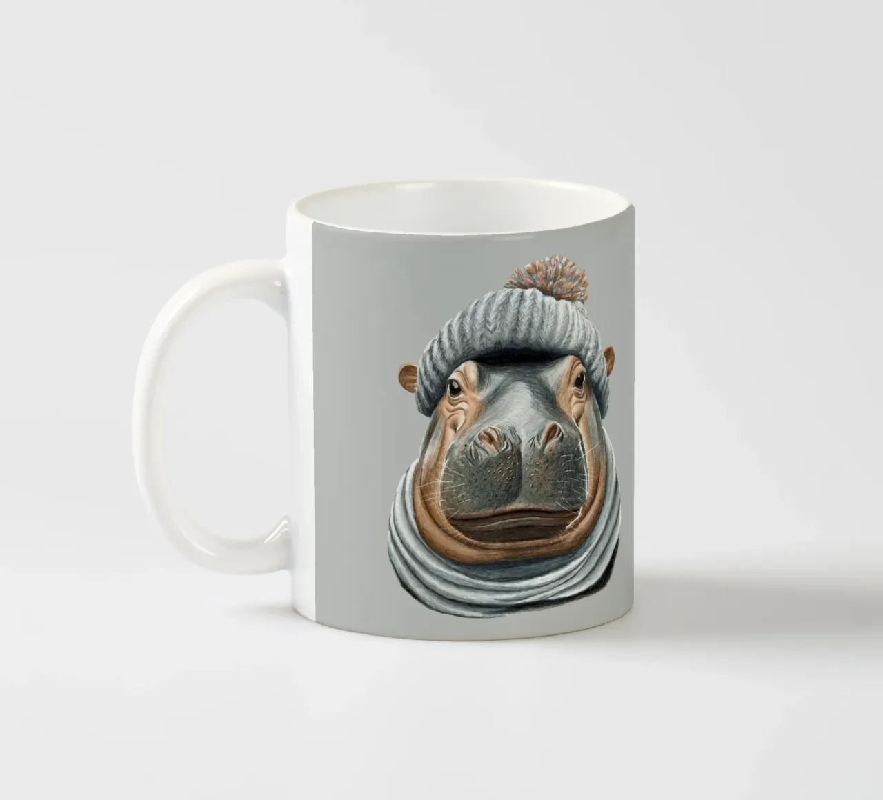 Ippopotamo con cappello a pompon tazza in ceramica da Graphit und Farbe