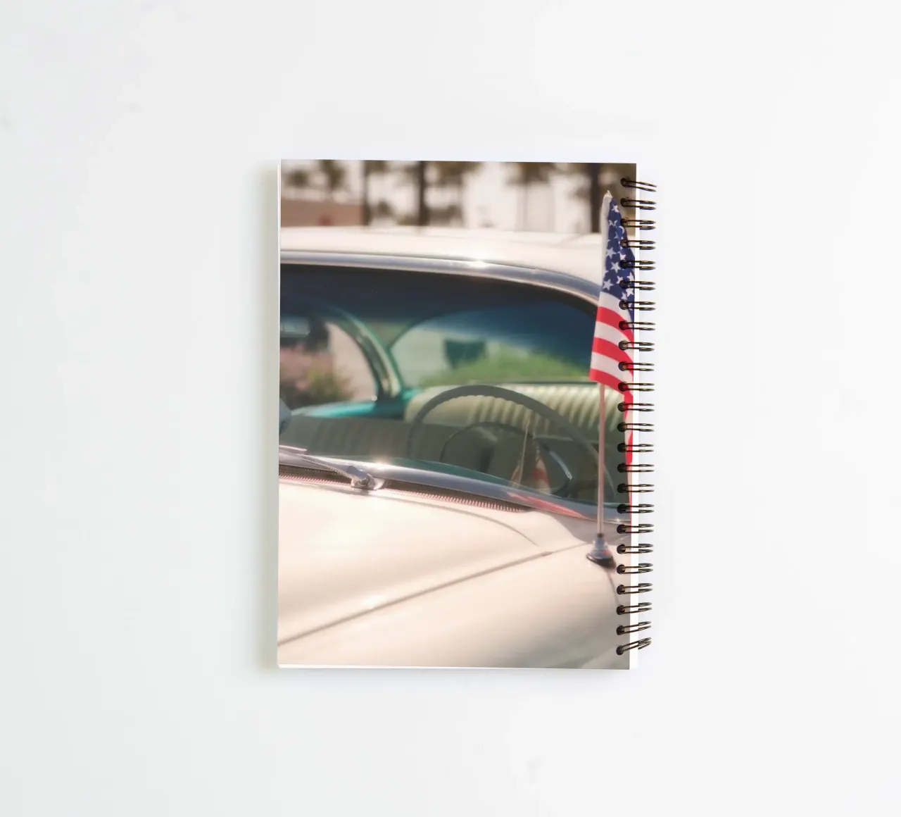 Car with Stars and Stripes flag spiral notebook by Dave Hare Photography