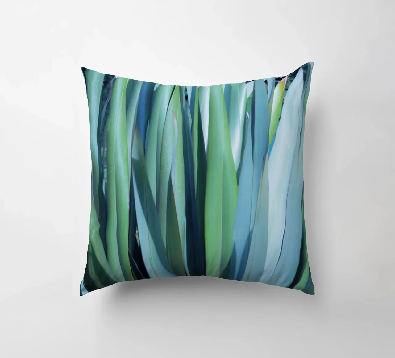 Green and Blue Leaves decorative cushion by Teresa André