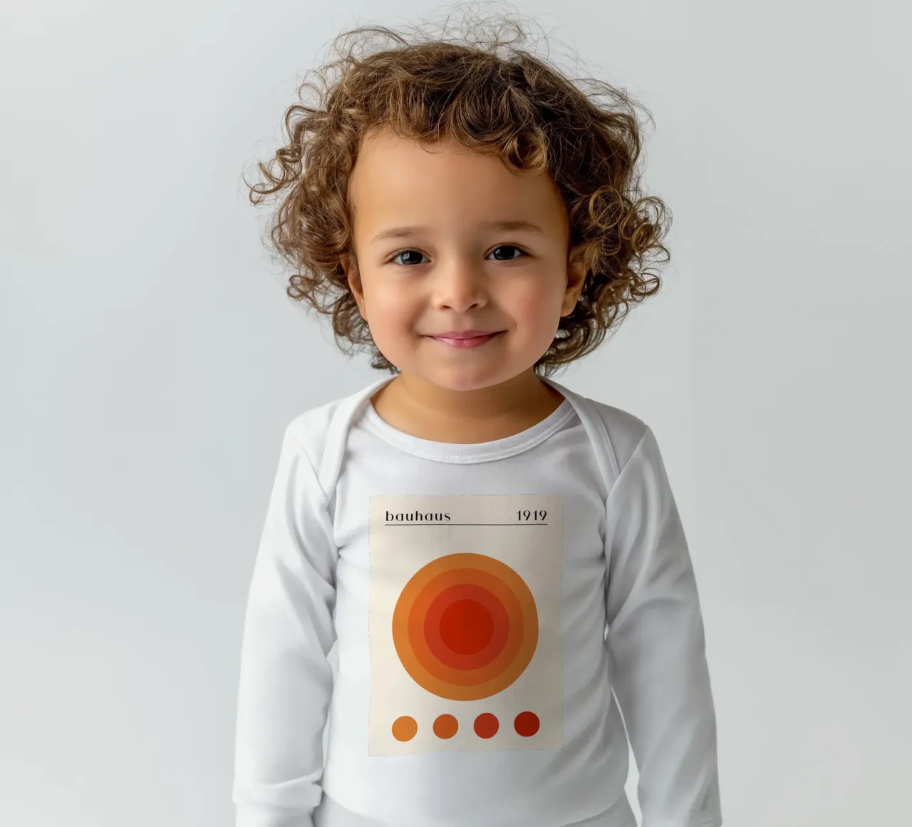 Bauhaus circle design orange long-sleeve baby romper by Whole©