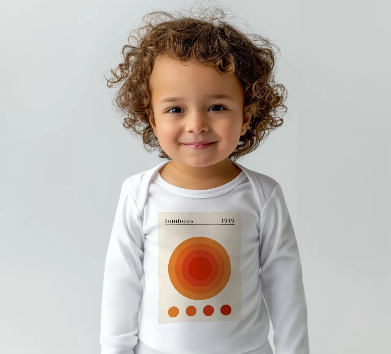 Bauhaus circle design orange long-sleeve baby romper by Whole©