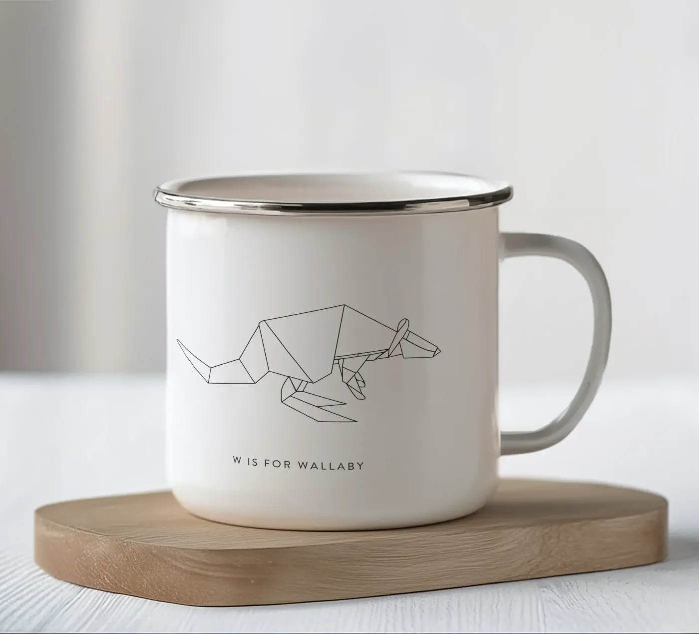 W enamel mug by Julia Marquardt-Lott