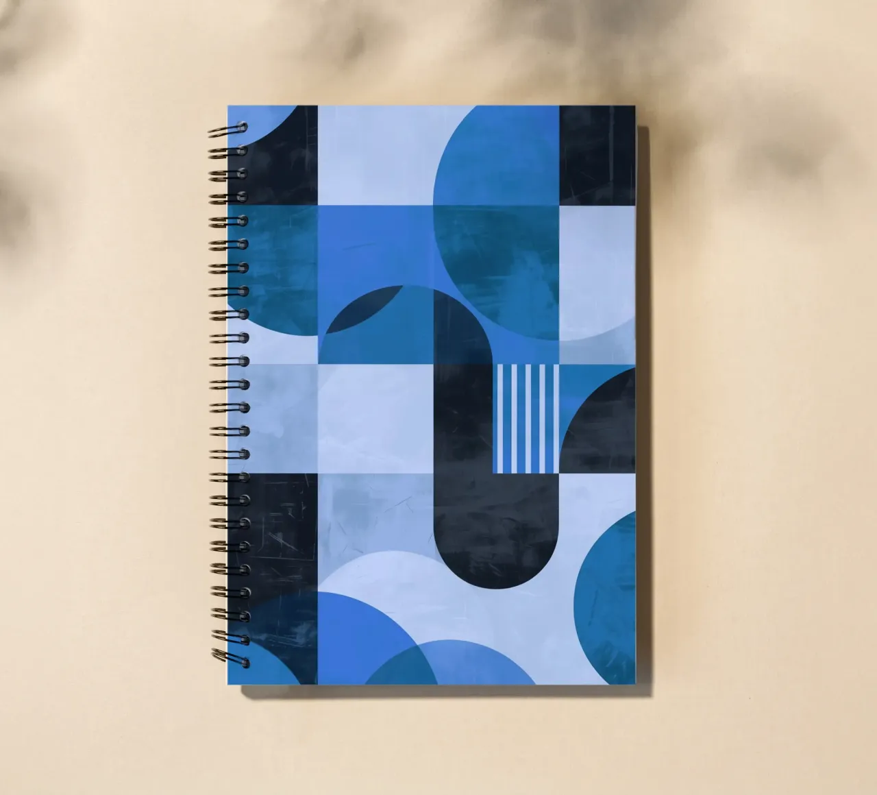 Abstract geometric shapes from the 70s in blue spiral notebook by Autofocus
