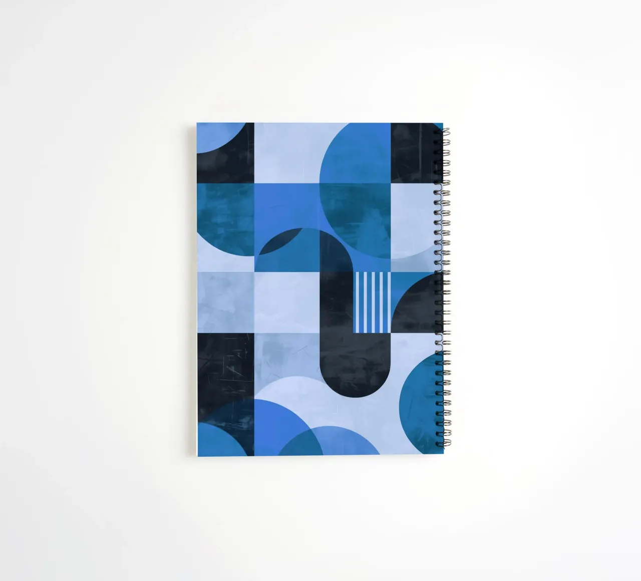 Abstract geometric shapes from the 70s in blue spiral notebook by Autofocus