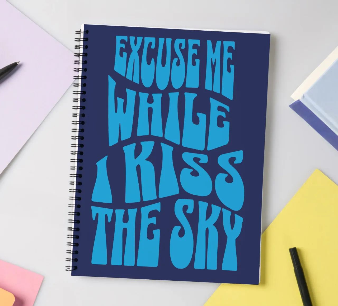 Excuse Me While I Kiss The Sky spiral notebook by Gunawan Rb