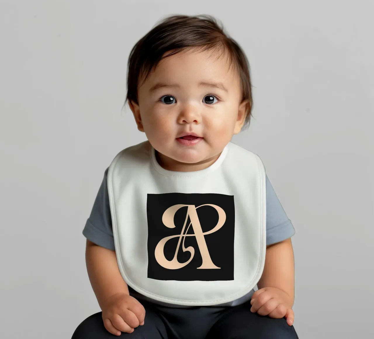 Cursive "A" baby bib by inspirational quote