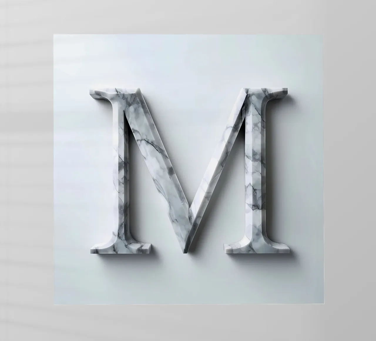 Monogramma "M" in marmo pellicola backlit da inspirational quote