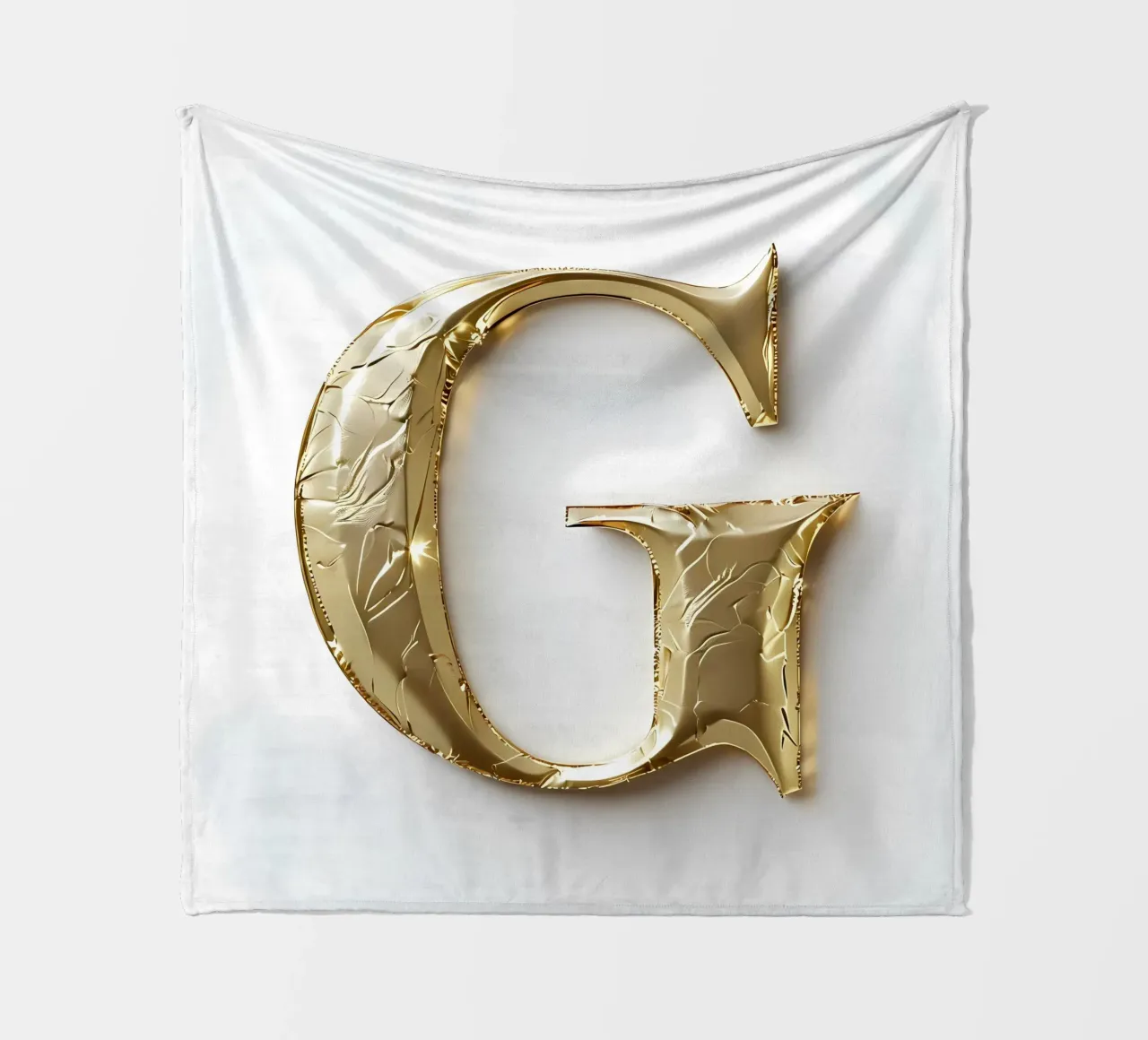La "G" d'oro - Un'opera d'arte coperta in pile da inspirational quote
