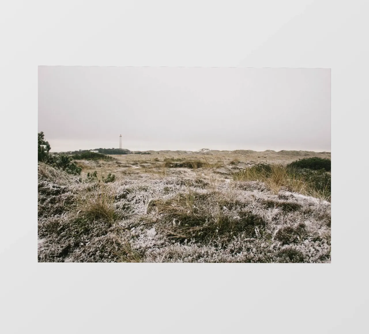 Leuchtturm in Winterlandschaft pellicola backlit da The Wild Creative Studio
