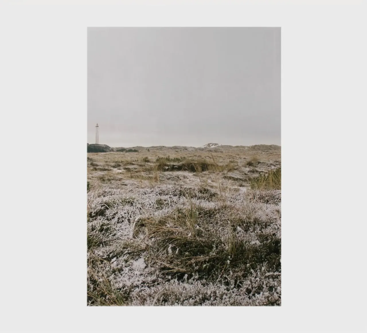 Leuchtturm in Winterlandschaft notebook by The Wild Creative Studio