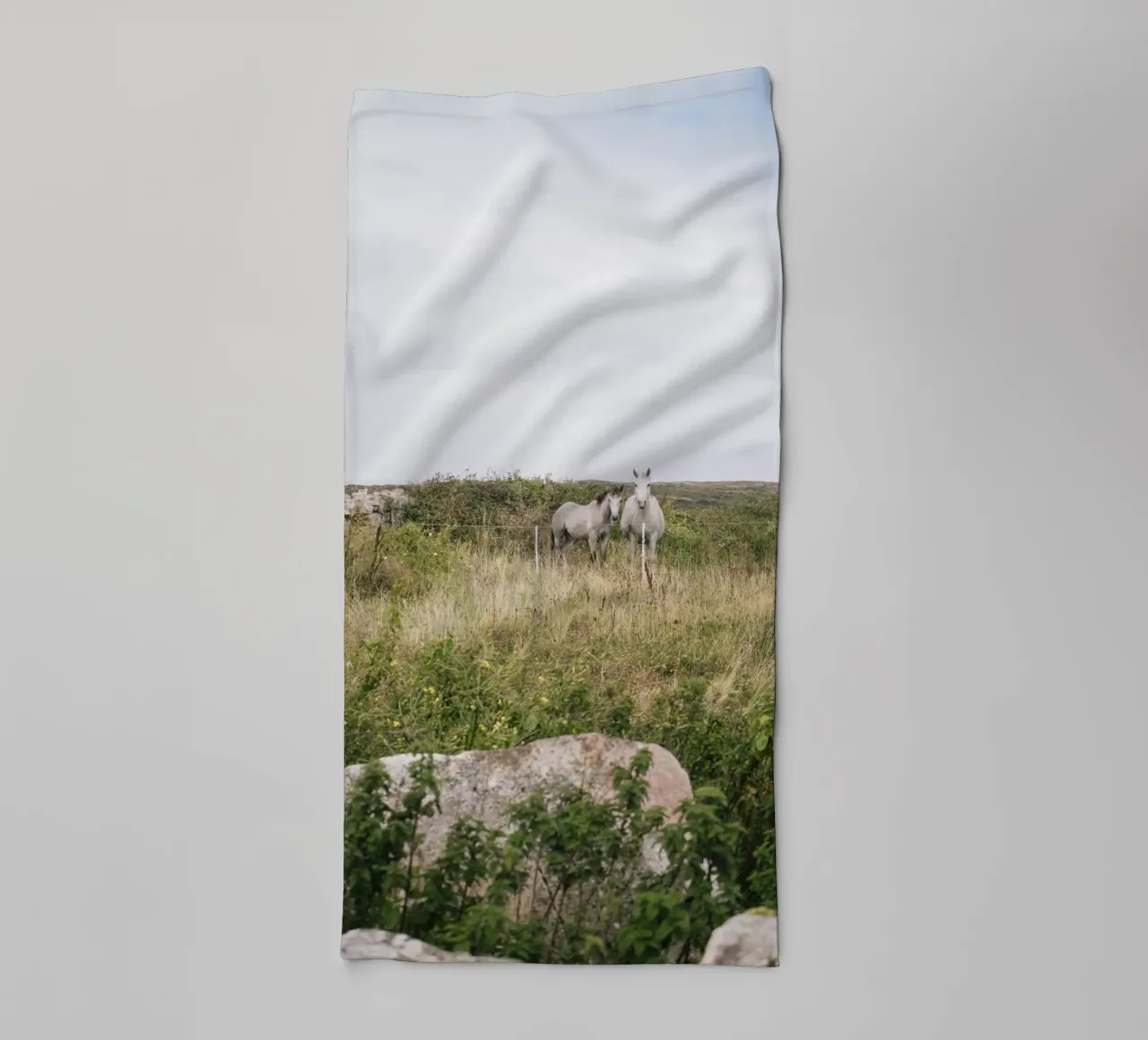 Horses in the pasture landscape towel by The Wild Creative Studio