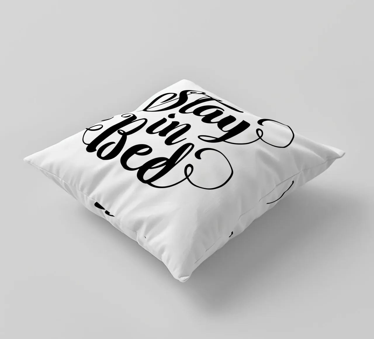 Stay In Bed Design tipografico in bianco e nero cuscino da THE MOTIVATED TYPE
