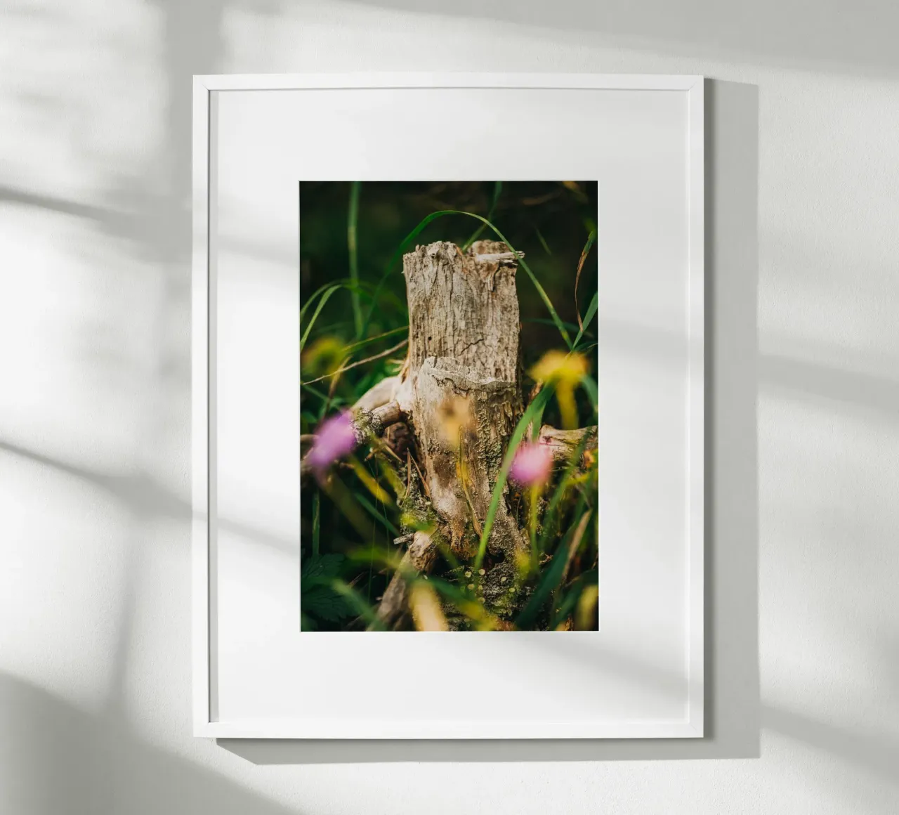 Tree trunk and flowers - nature photography from the Alps poster with plastic frame by Bold and Retro