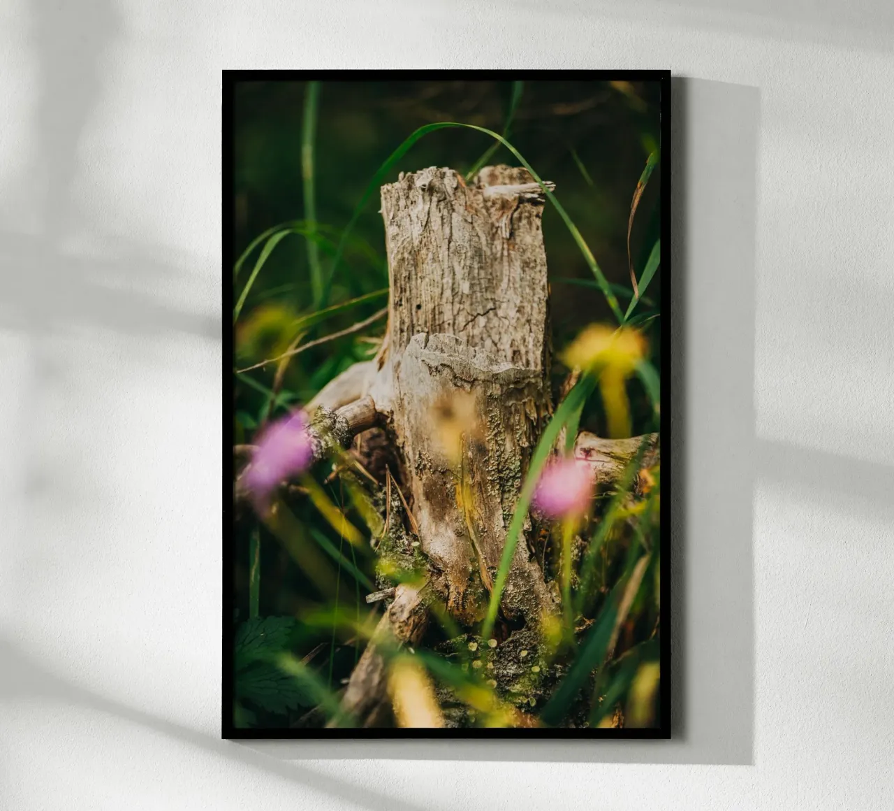 Tree trunk and flowers - nature photography from the Alps poster with plastic frame by Bold and Retro