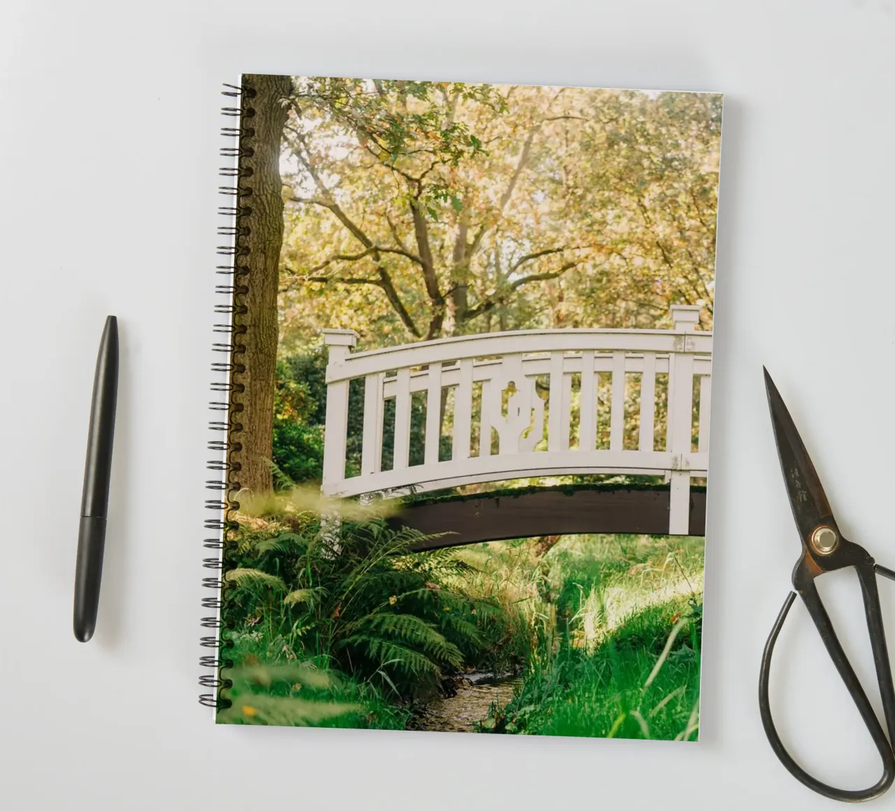 White bridge in the forest - summer idyll by the stream spiral notebook by Bold and Retro