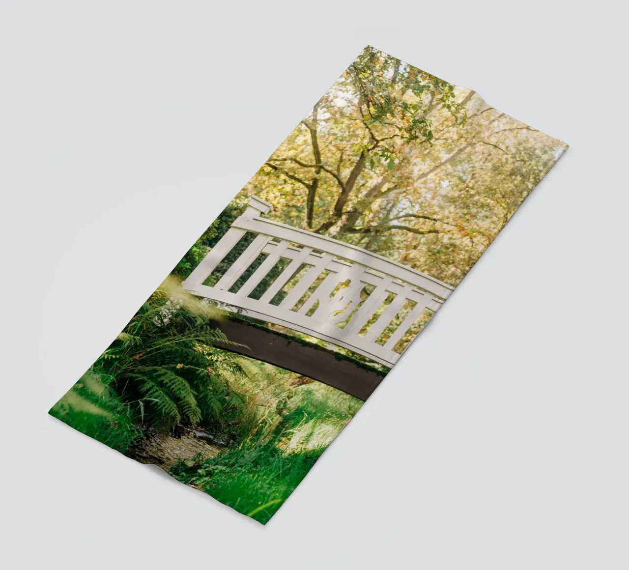 White bridge in the forest - summer idyll by the stream beach towel by Bold and Retro
