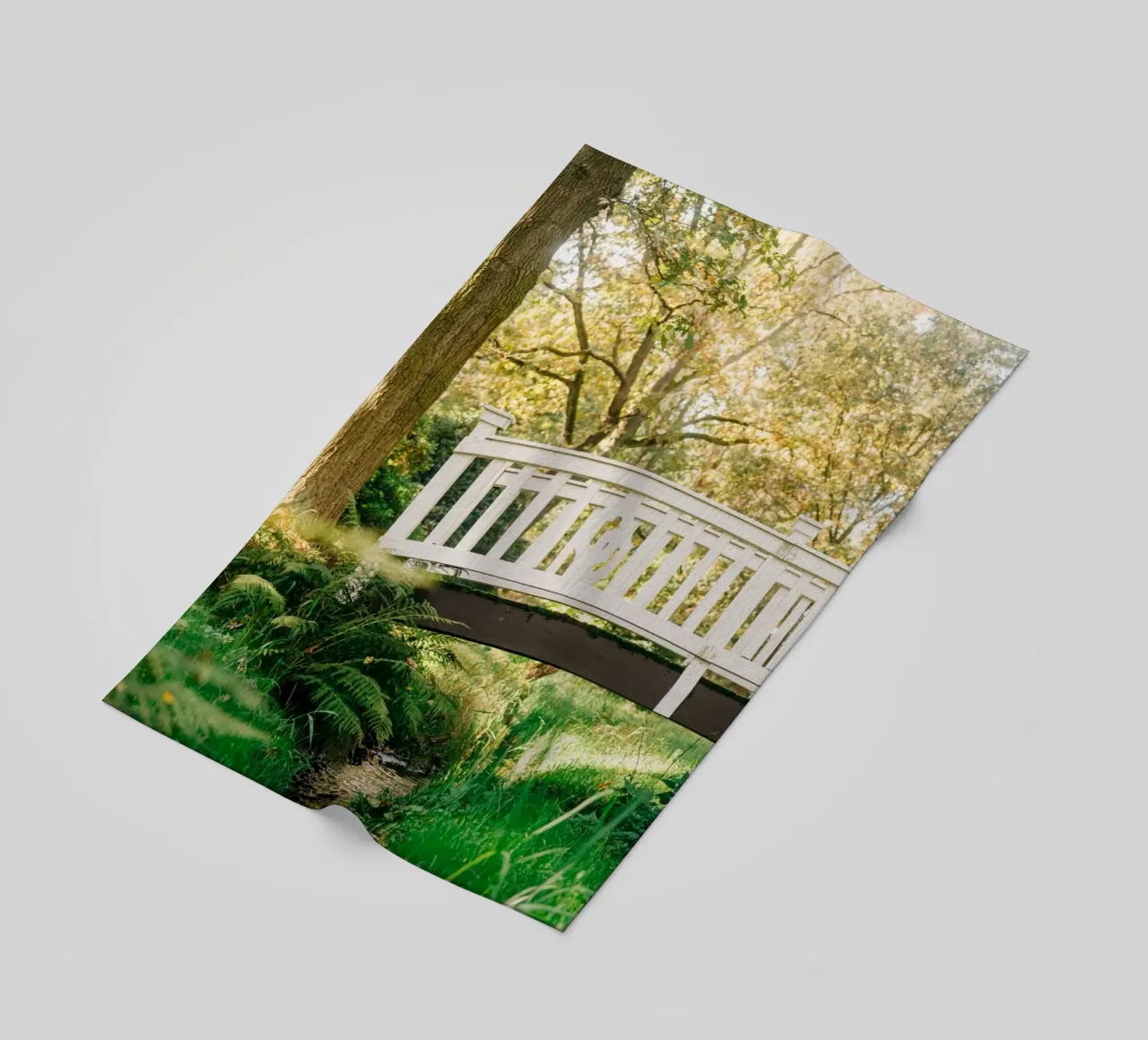 White bridge in the forest - summer idyll by the stream beach towel by Bold and Retro
