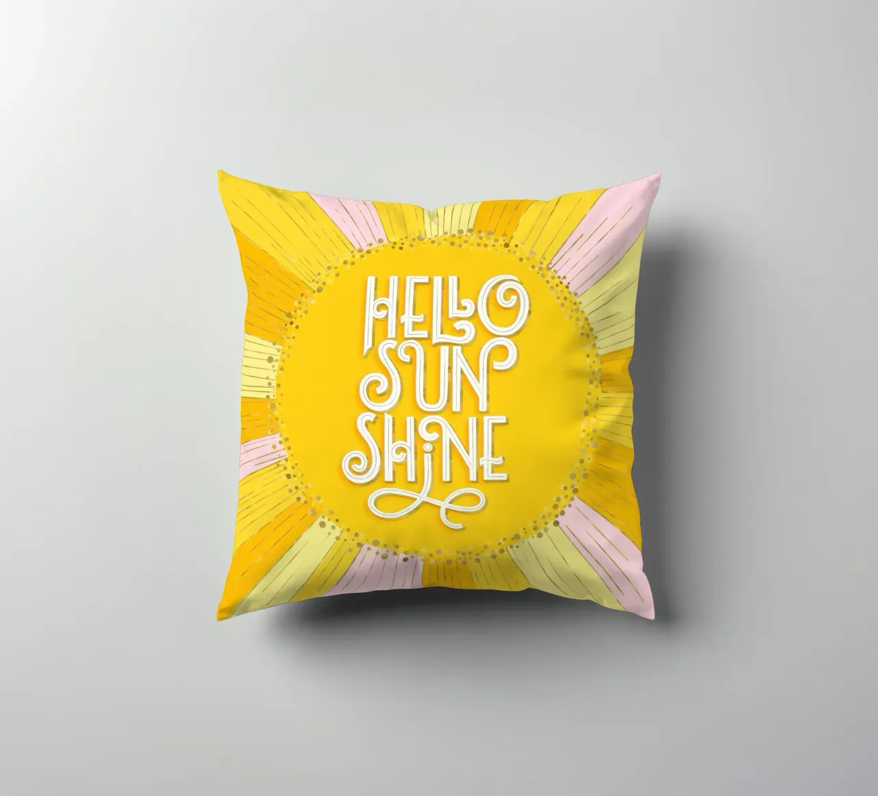 Hello Sunshine. Hand lettering on yellow, orange and pink decorative cushion by CalliLetters
