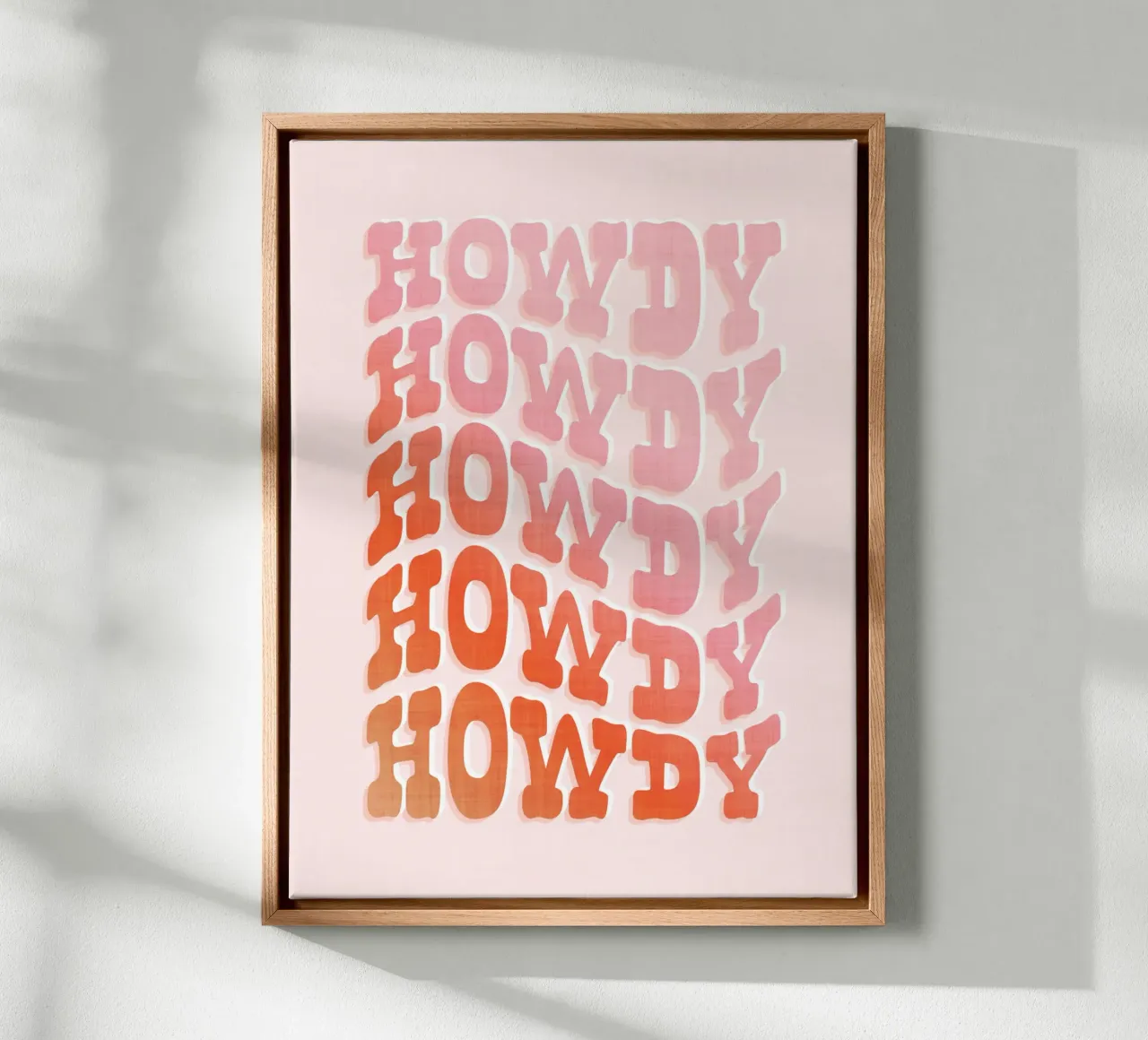 Ripetizione tipografica Wild West Howdy - Rosa pesca pastello tela con Cornice a cassetta da Dominique Vari Words