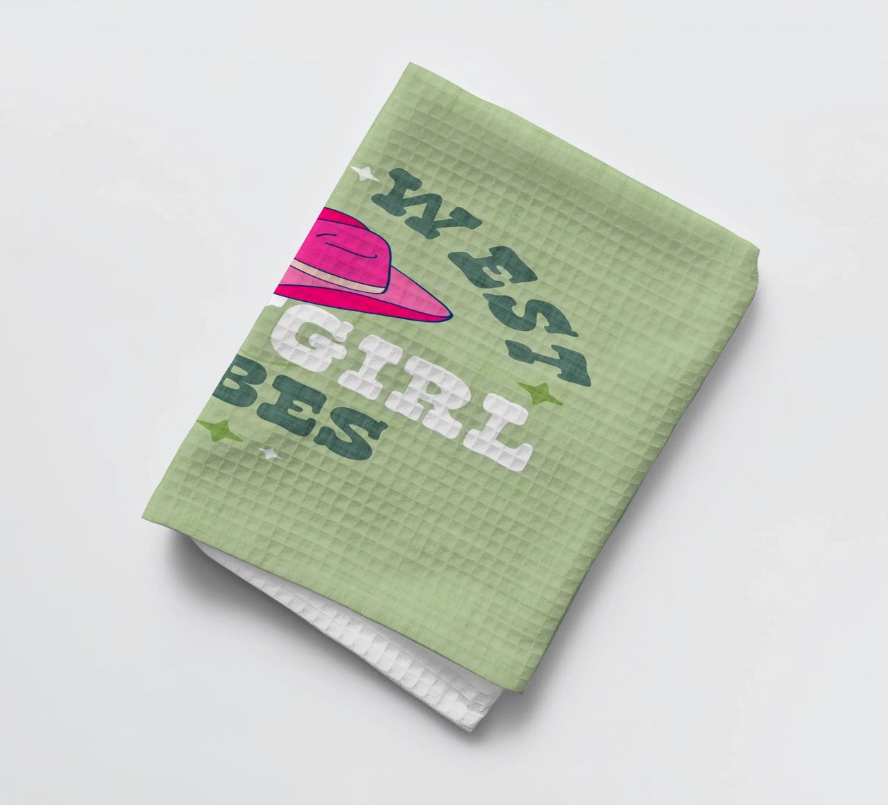 Typographie Wild West Cowgirl Vibes sur fond vert pastel torchon de Dominique Vari Words