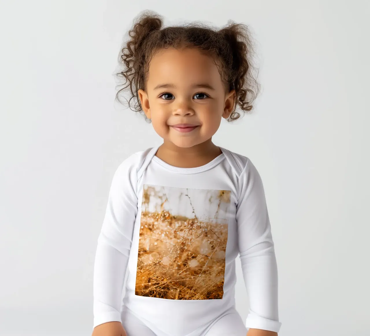 Drops of water on grass in the forest - dew in the morning light long-sleeve baby romper by Bold and Retro