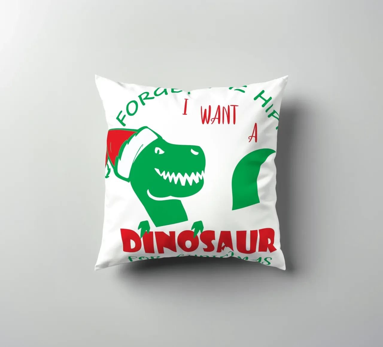 Dimenticate l'ippopotamo, voglio un dinosauro per Natale. cuscino da vickeyroads
