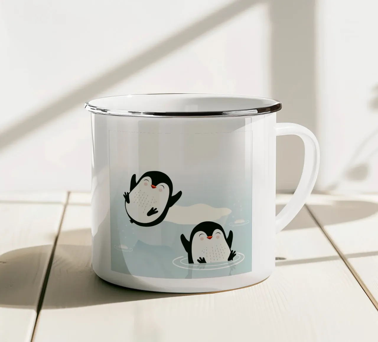 Due pinguini che giocano in acqua tazza in smalto da namosh