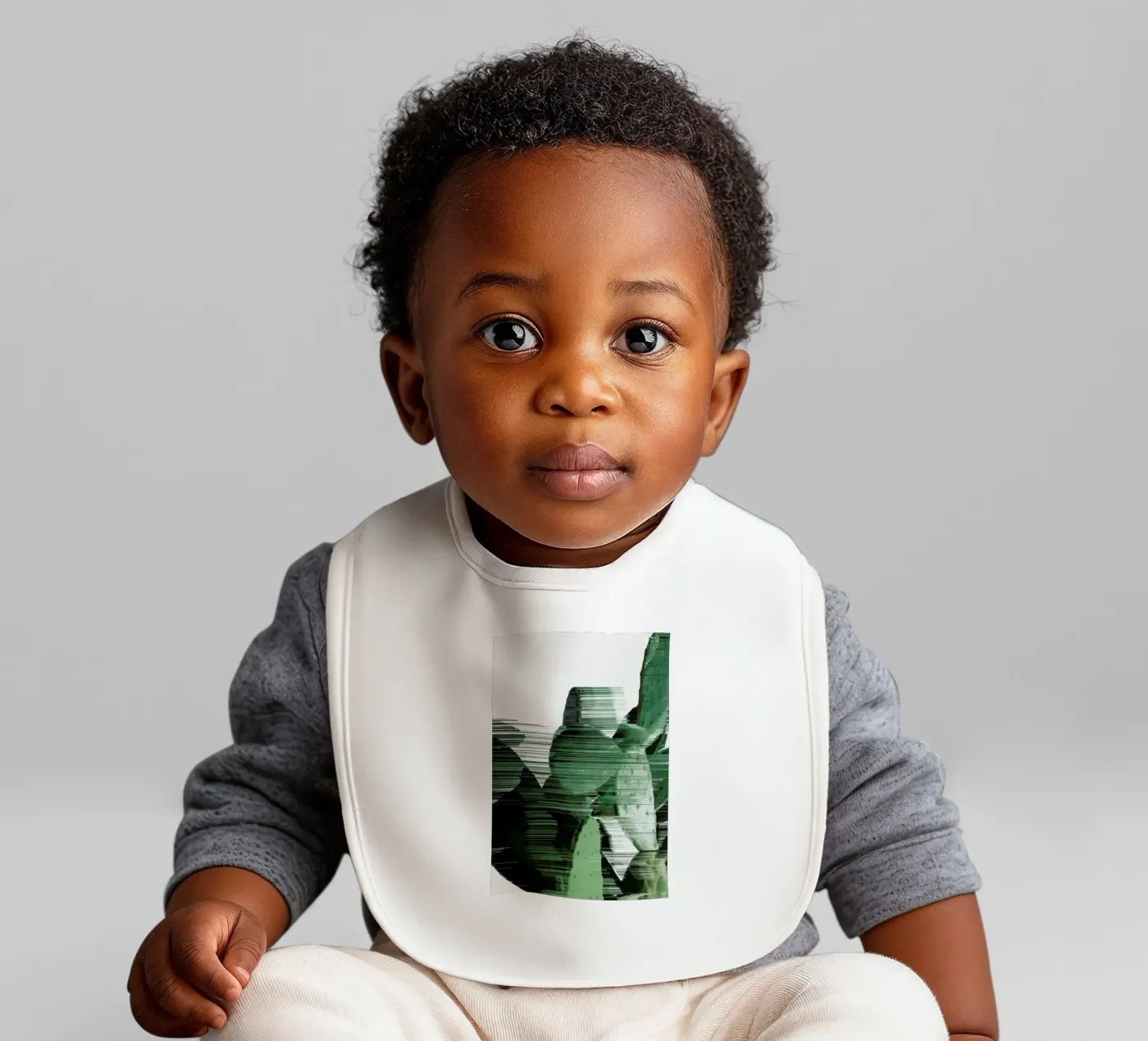 Sorted Cactus baby bib by Adam Priester