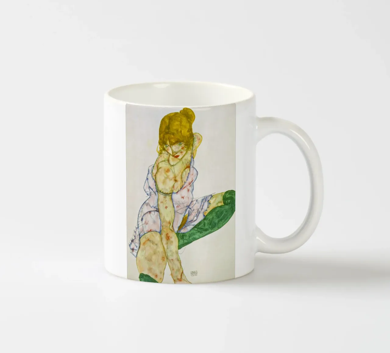 Egon Schiele - Ragazza bionda con calze verdi tazza in ceramica da ARTOTHEK