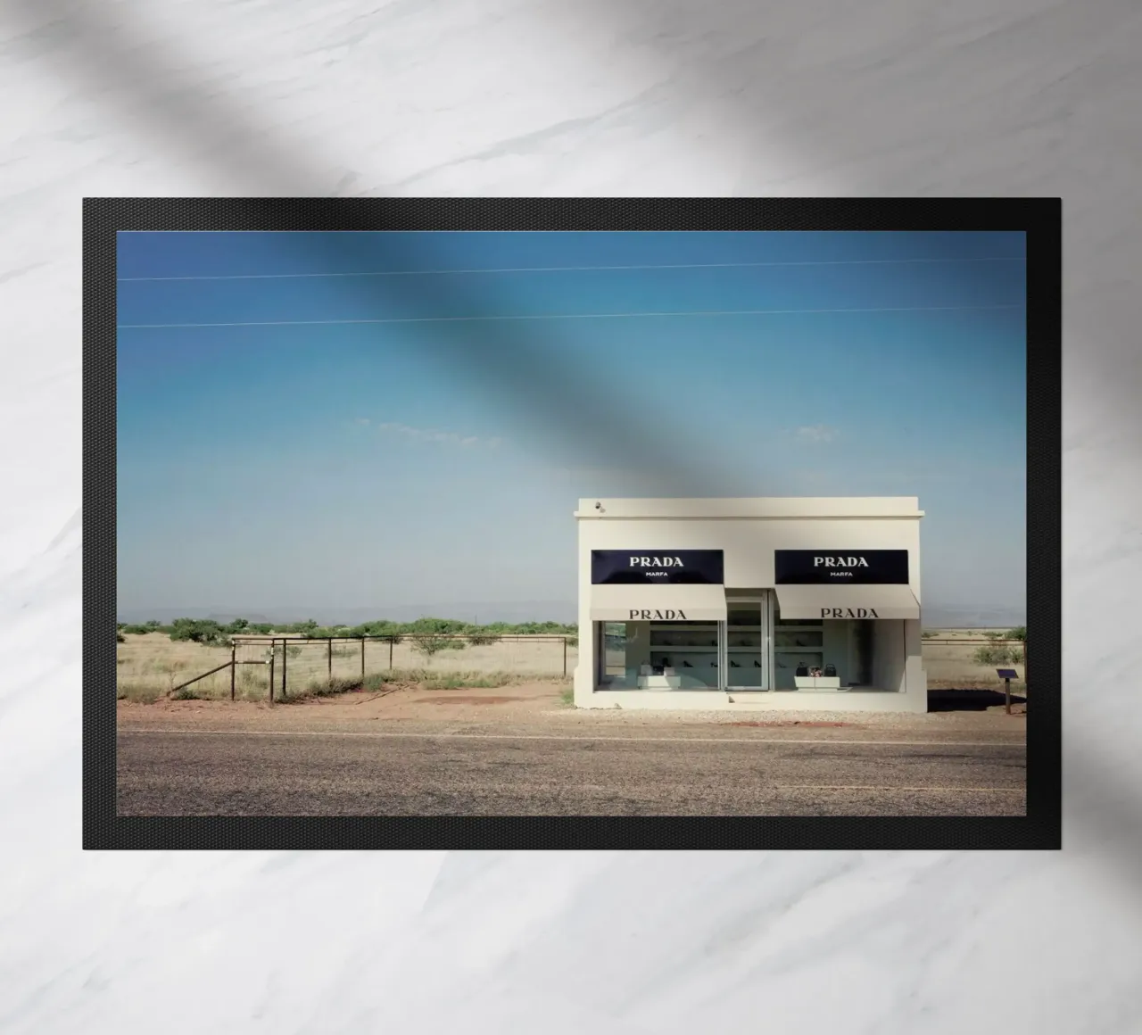 Prada Marfa doormat by Catherine McDonald