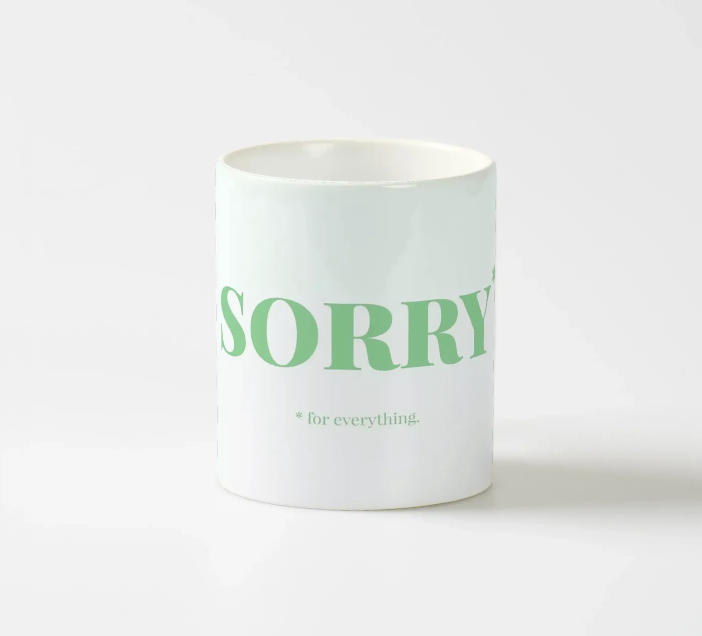 Sorry ceramic mug by Chris Wharton