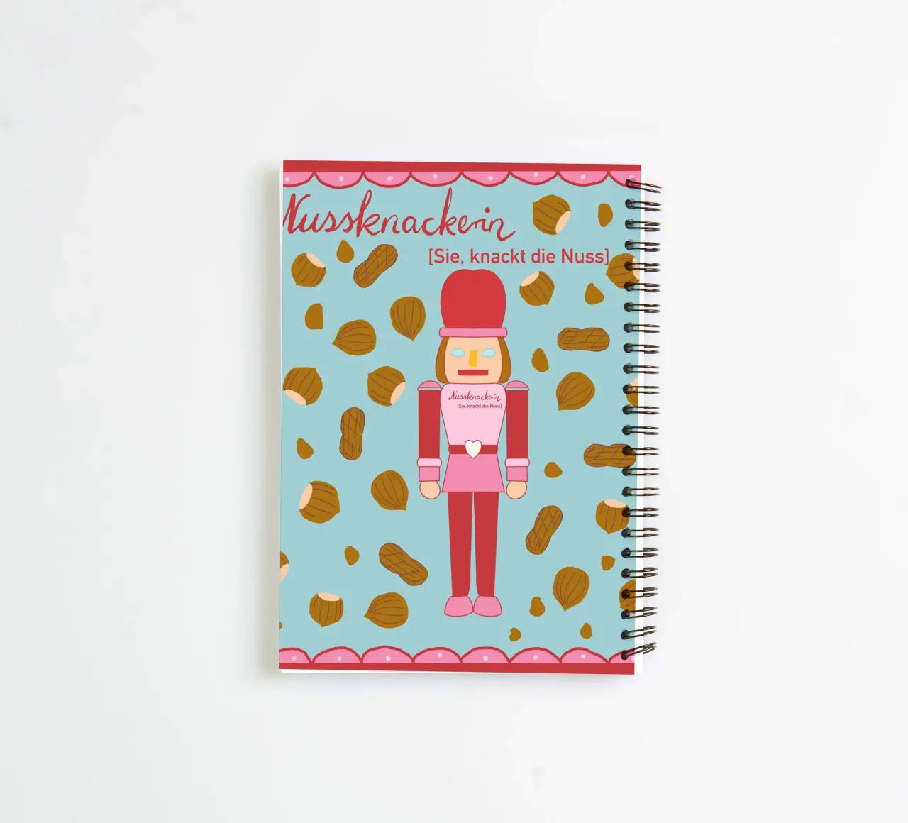 Nussknackerin - Sie, knackt die Nuss spiral notebook by Miris bunte Modewelt