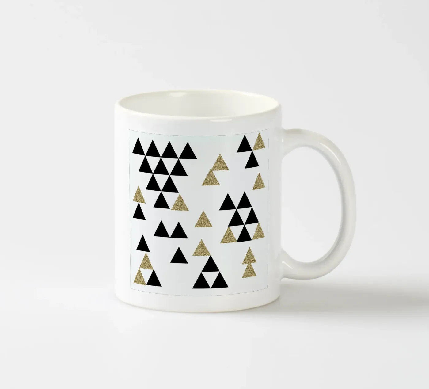 Triangle Town ceramic mug by Charlotte Winter