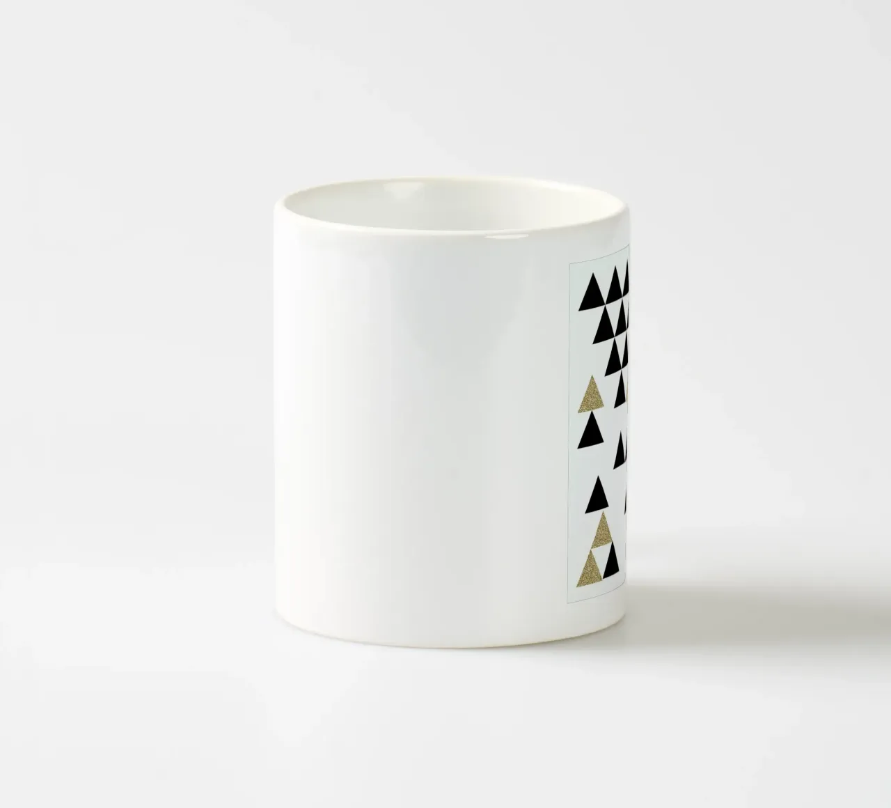 Triangle Town ceramic mug by Charlotte Winter