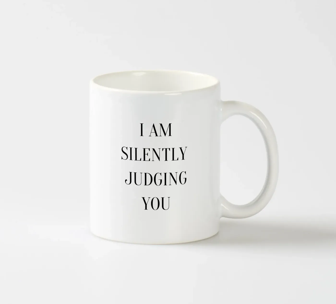 judging ceramic mug by Alina