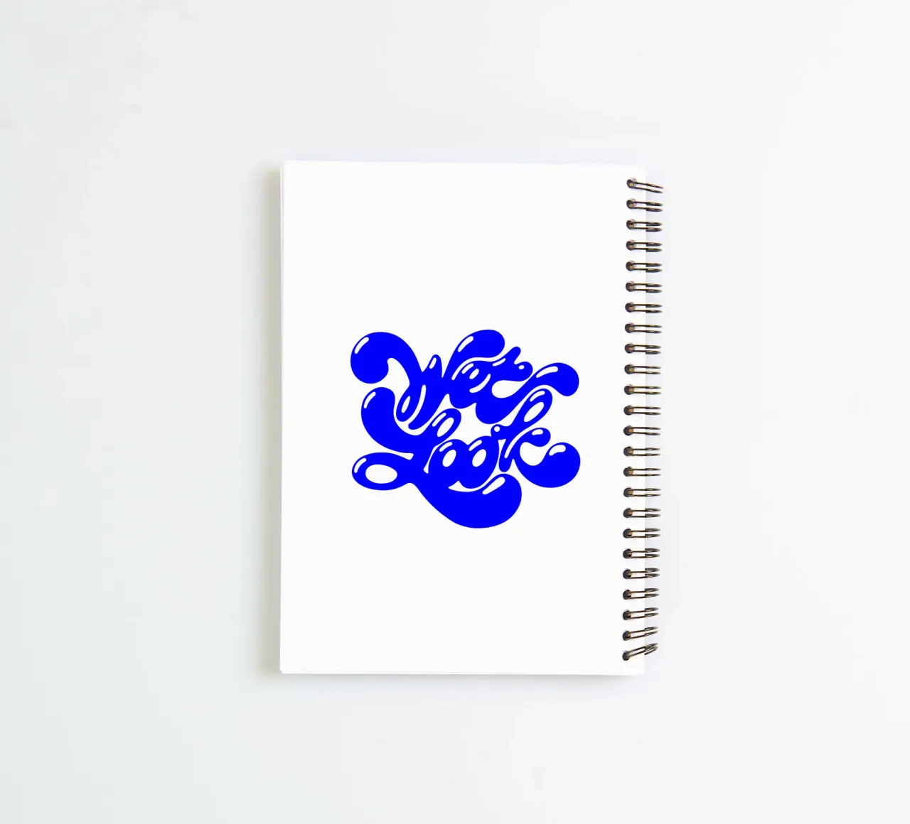 wet look, statement typography spiral notebook by The True Type