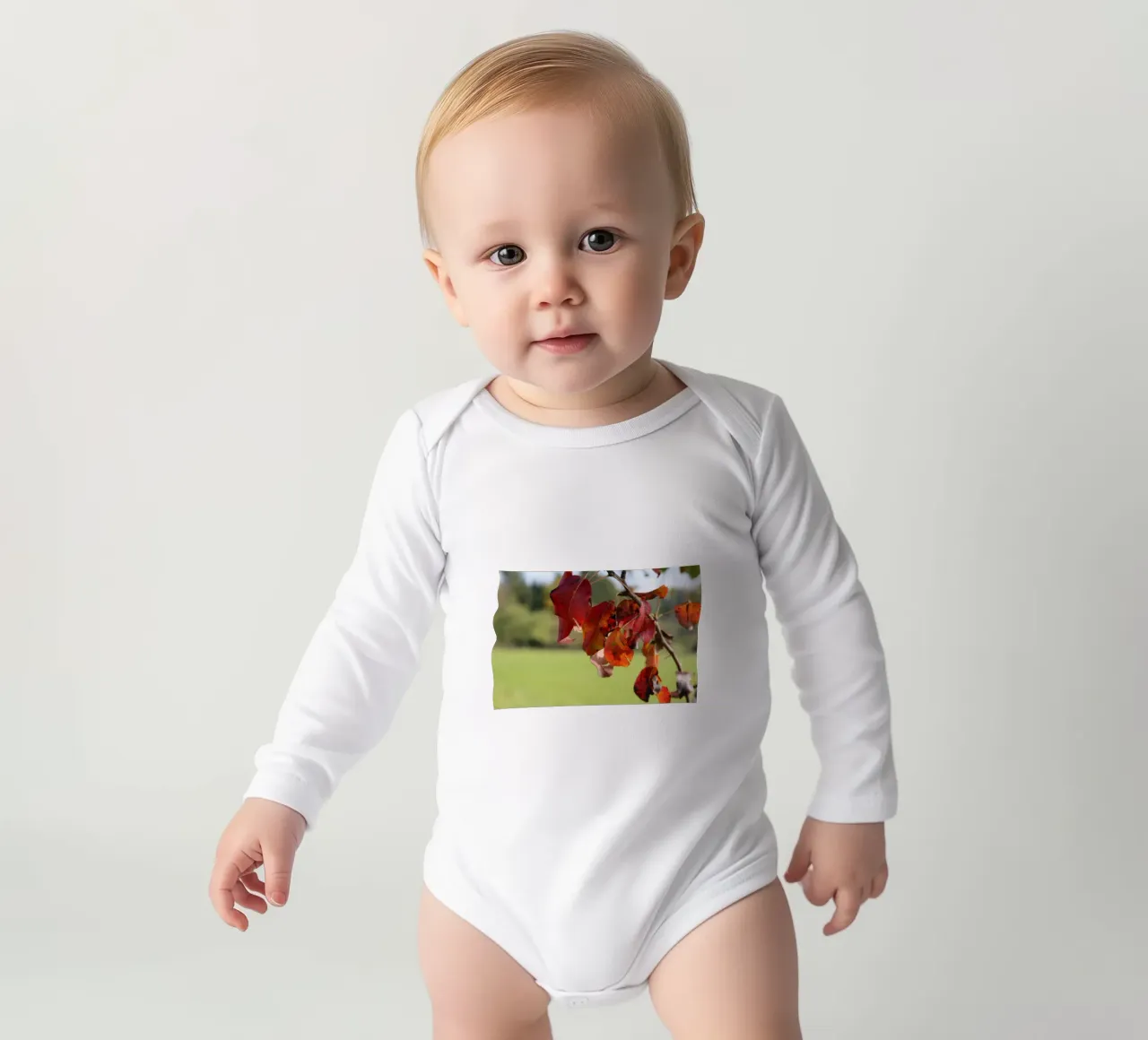 Autumn colours long-sleeve baby romper by Alexandra Joseph Fotomomente