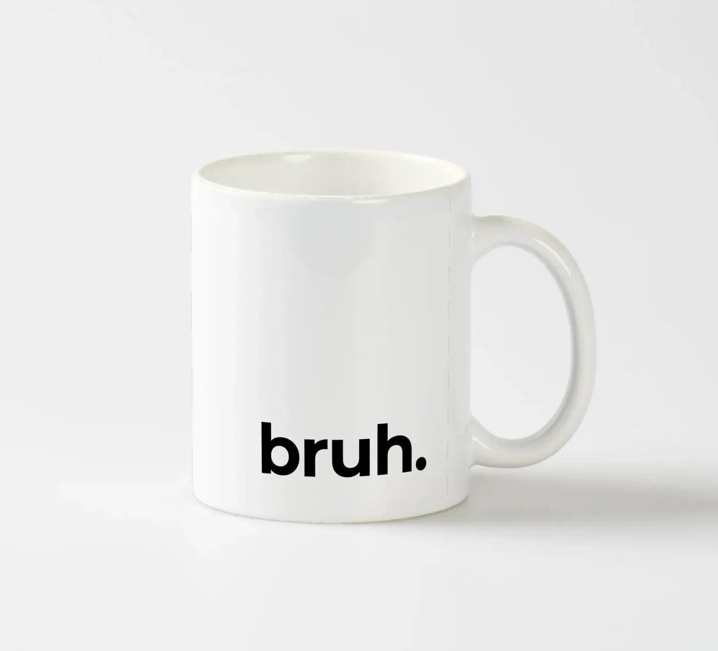 Bruh ceramic mug by Paigaam Studio