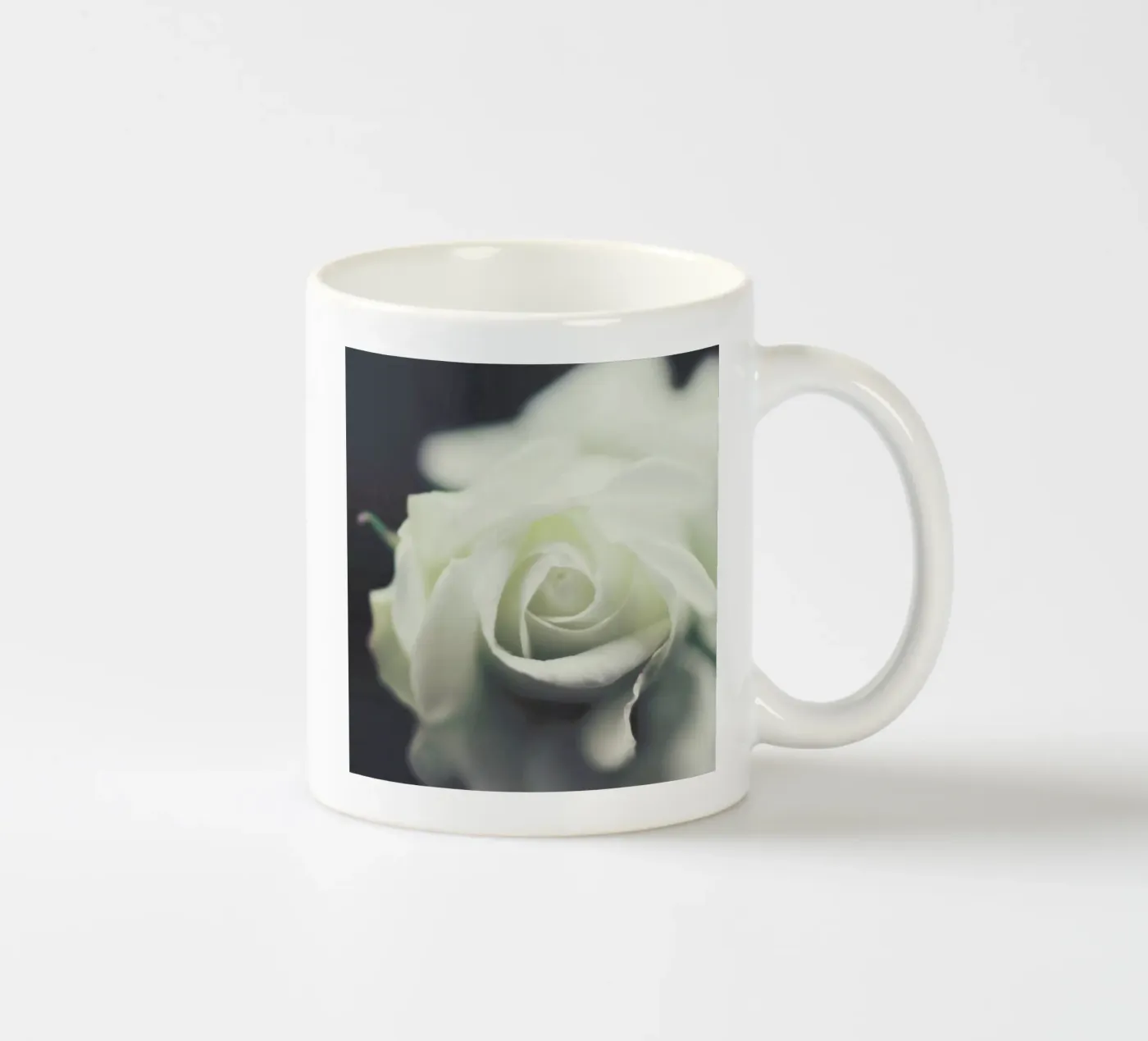 Ivory ceramic mug by Ingrid Beddoes