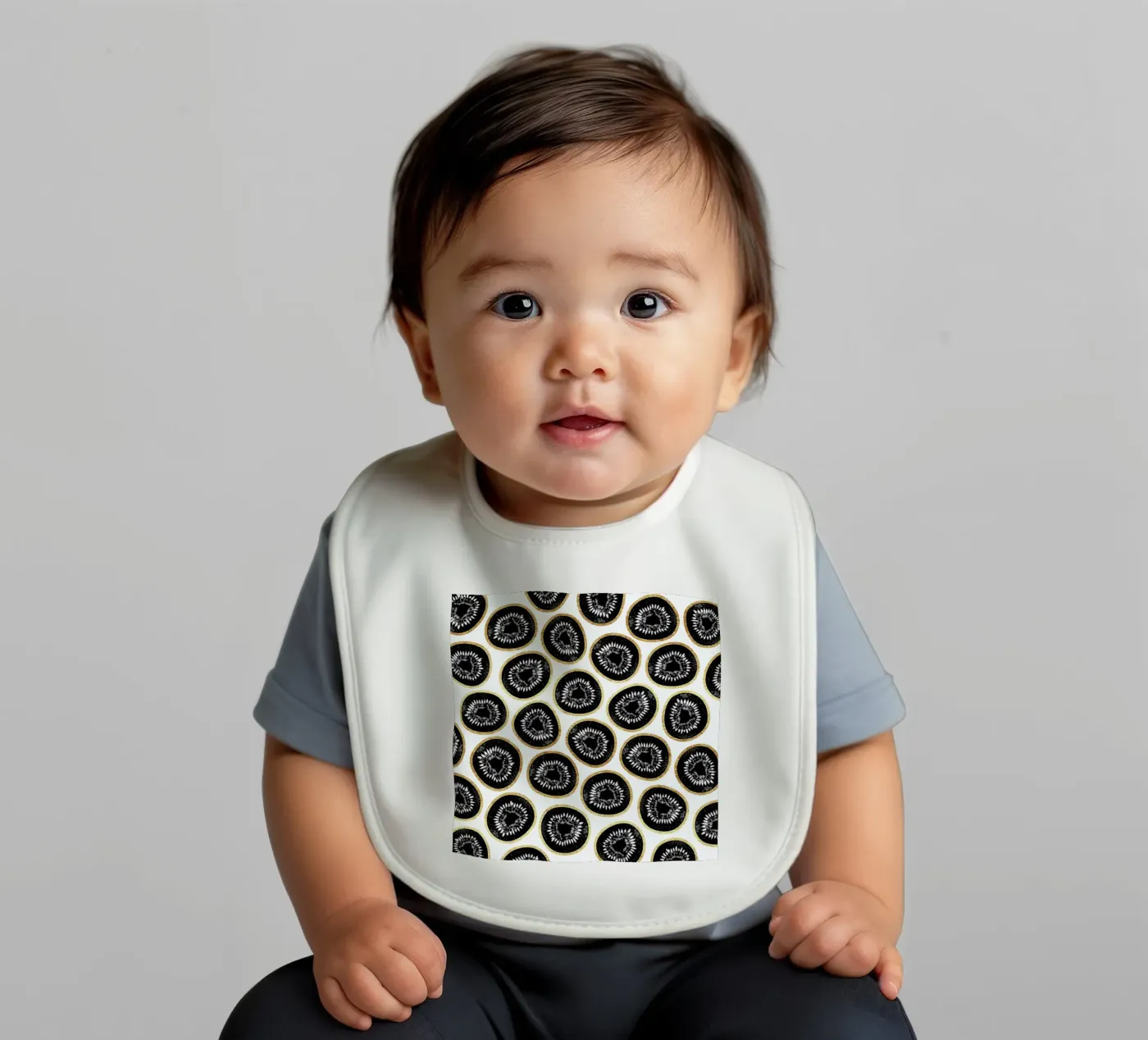 Kiwi Pattern baby bib by Elisabeth Fredriksson