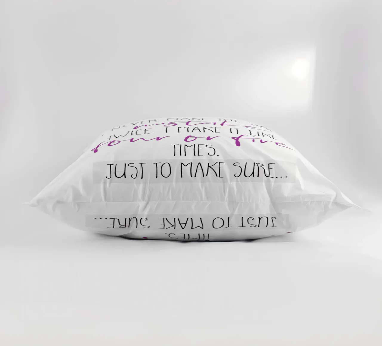 I never make the same mistake twice | pink decorative cushion by Melanie Viola
