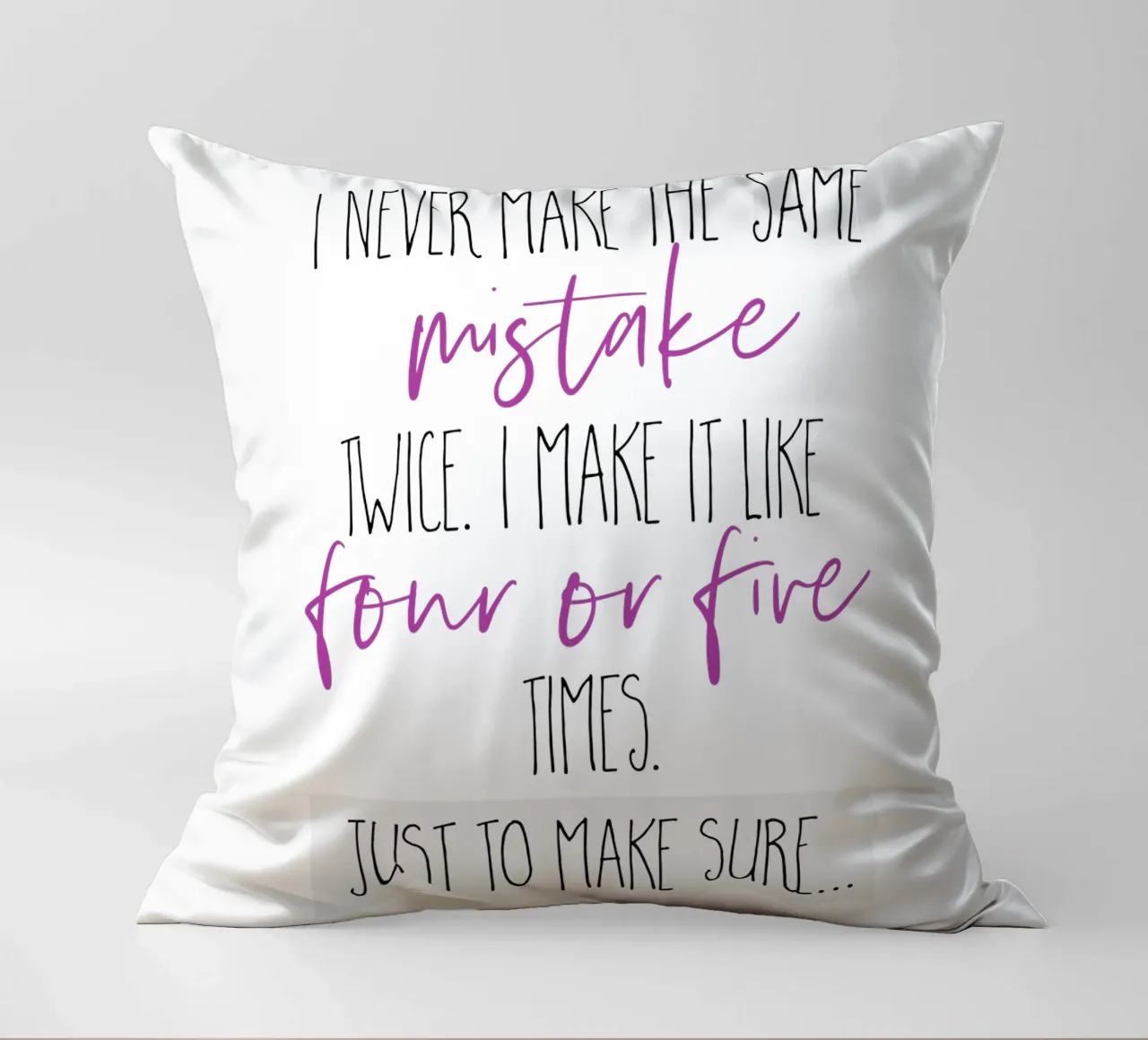 I never make the same mistake twice | pink decorative cushion by Melanie Viola