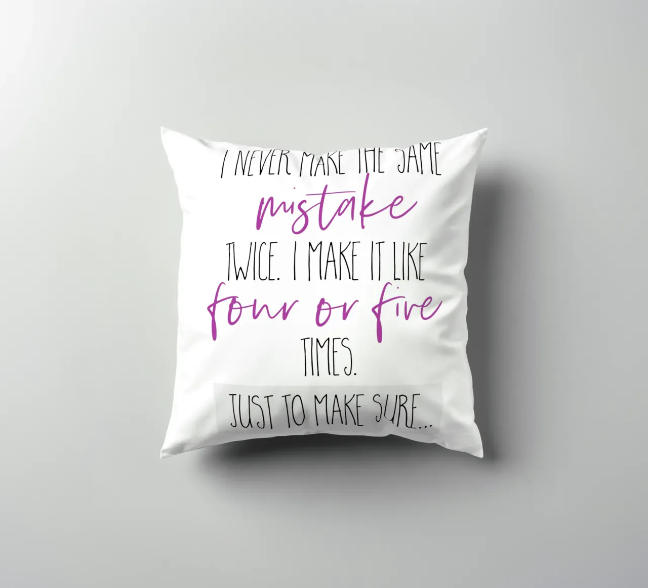 I never make the same mistake twice | pink decorative cushion by Melanie Viola