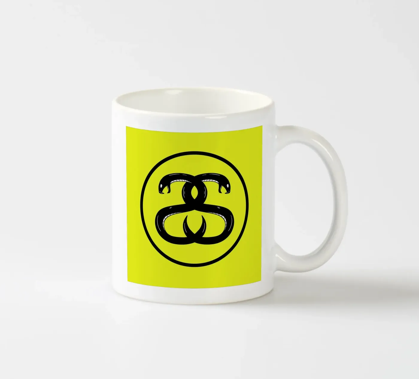 Double Snakes ceramic mug by Zhi Yun Zhang