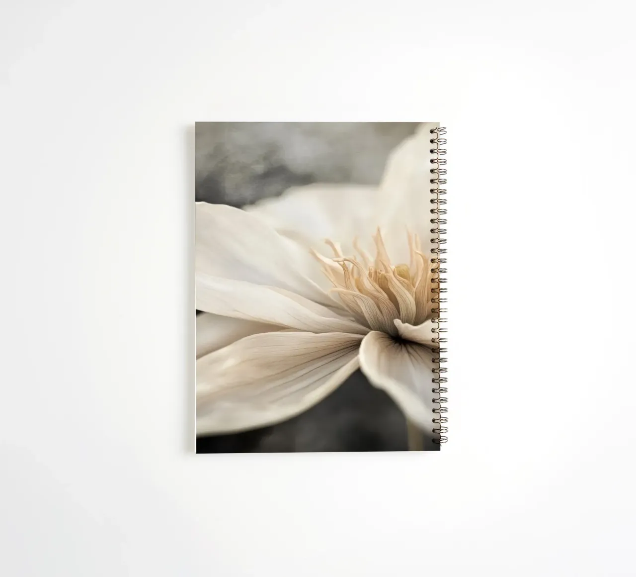 A beige flower spiral notebook by Imagine
