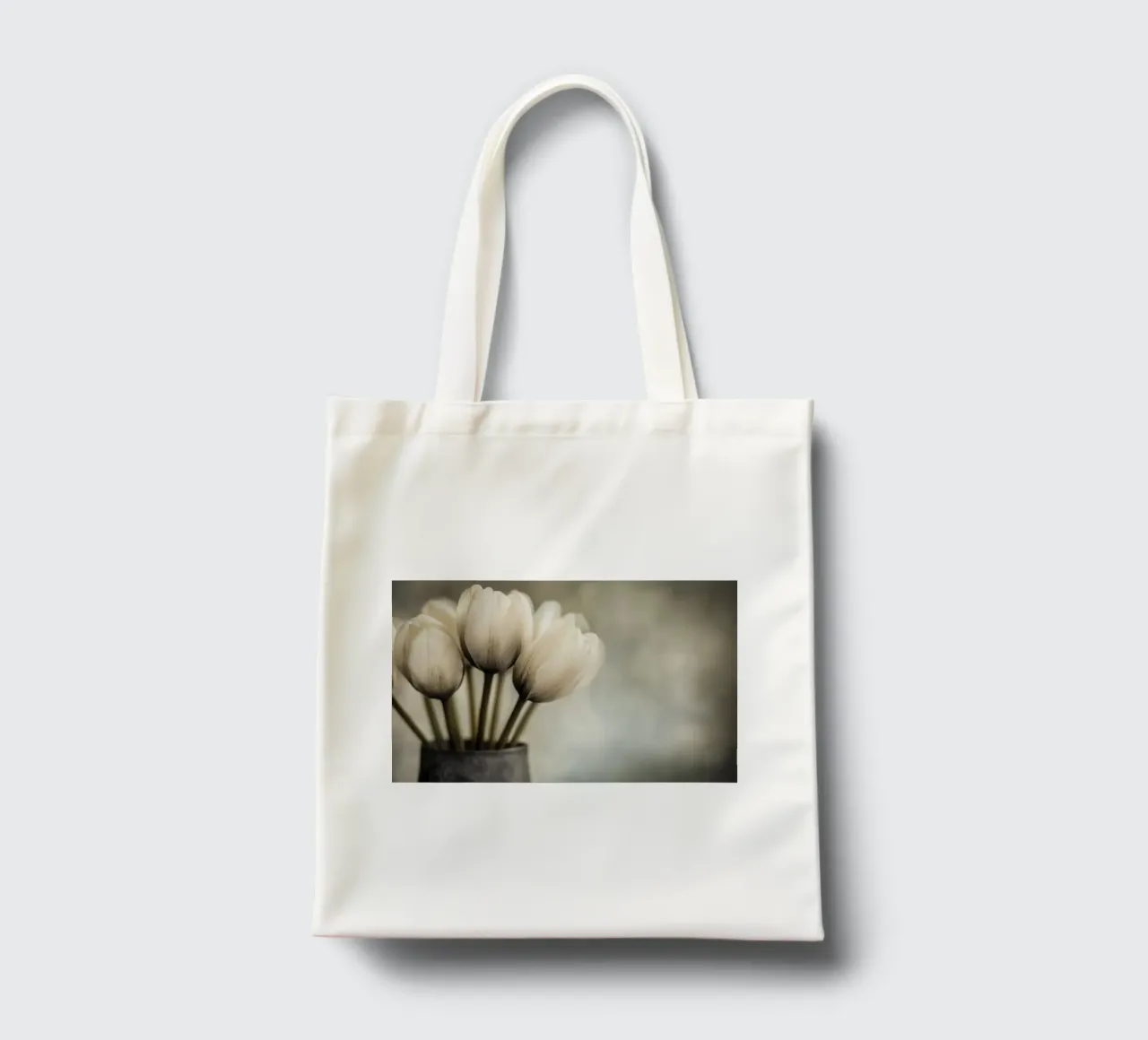 Un vaso con tulipani dai colori tenui borsa in juta da Imagine